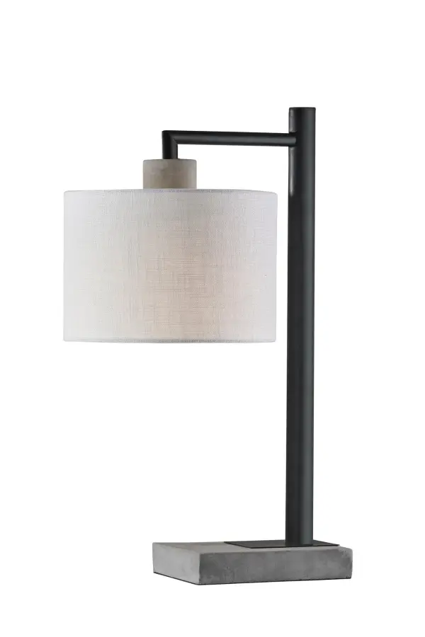 The Devin Table Lamp balances industrial edge with softening elements through its concrete and metal base paired with a textured white fabric shade. At 22.5" tall, it's perfectly sized for accent lighting in modern spaces.
