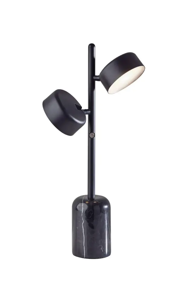 The Bryant LED table lamp combines modern design with practical functionality. Its black marble base and dual adjustable disc shades offer directed lighting with flicker-free LED technology and 3-level touch dimming.