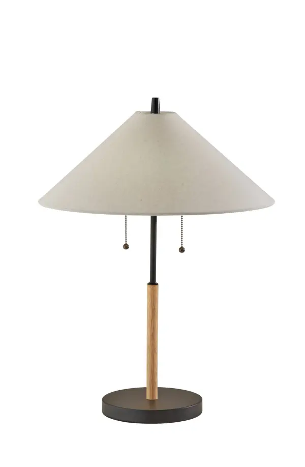 The Palmer table lamp blends natural wood and black metal in a minimalist design perfect for modern spaces. At 24" tall with an 18" diameter shade, it provides warm ambient lighting through dual 40W bulbs.