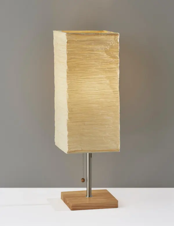 The Dune table lamp brings warmth and texture to any space with its natural rubberwood base and distinctive crinkle paper shade. Perfect for adding organic character while maintaining a clean, modern aesthetic. - alternate view