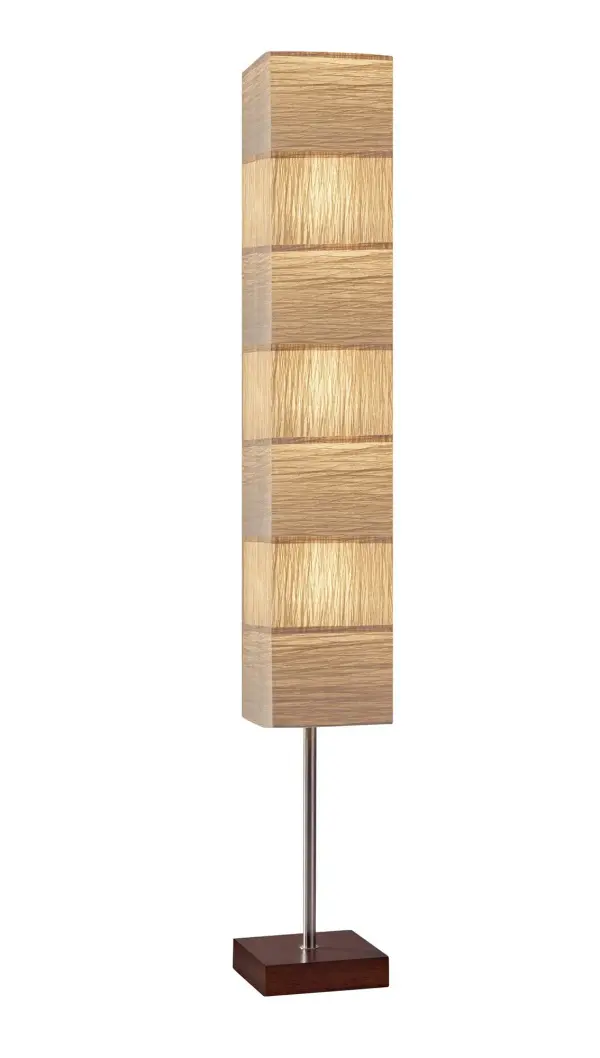 The Sahara Tall Floorchiere brings calming, natural elegance to any space with its 72-inch height and handwoven crinkle paper shade. The walnut wood cube base and brushed steel pole create a sophisticated transitional look.