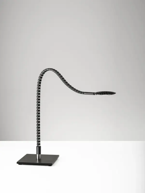 The Natrix LED Desk Lamp by designer Hans Nopper features a revolutionary spine-like structure with completely flexible arm adjustment. High-tech materials and 800 lumens of dimmable warm LED light make this a functional and striking addition to any workspace. - alternate view