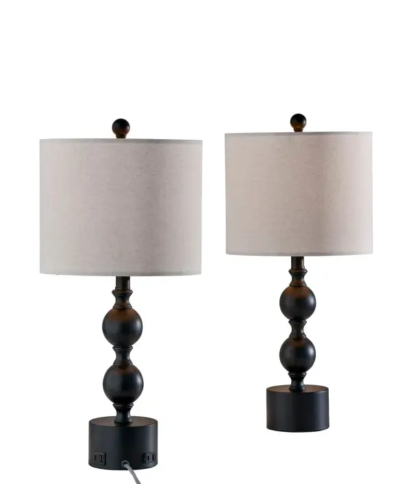 This table lamp features a turned wood-inspired base with a drum shade for a warm, familiar look that fits effortlessly into casual interiors. The classic silhouette adds traditional character, while the natural finish keeps it approachable and versatile. It is an easy choice for bedrooms, living rooms, and everyday side tables. Collection: Julius Finish: Black Finsh With Linen Glass: Linen texture fabric shade Width: 11.00" Height: 23.83" Length: 11.00" Weight: 11.00 lb Extension from Wall: 11.00" Wire: 60" Clear cord Maximum Wattage: 100.00 W Bulb Base: E26 Light Source: Incandescant Material: Poly:50% Fabric:20% Iron:10% Electric:20% Country of Origin: Cambodia Safety Listing: ETL Switch: On/off rotary socket switch