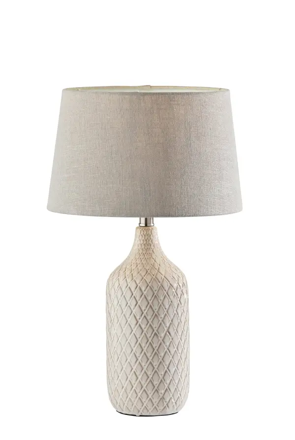 The Kathryn set brings dimensional texture and neutral sophistication with jug-shaped ceramic bases featuring a diamond pattern. Taupe fabric shades complement the off-white, grey, and natural tones for versatile styling.