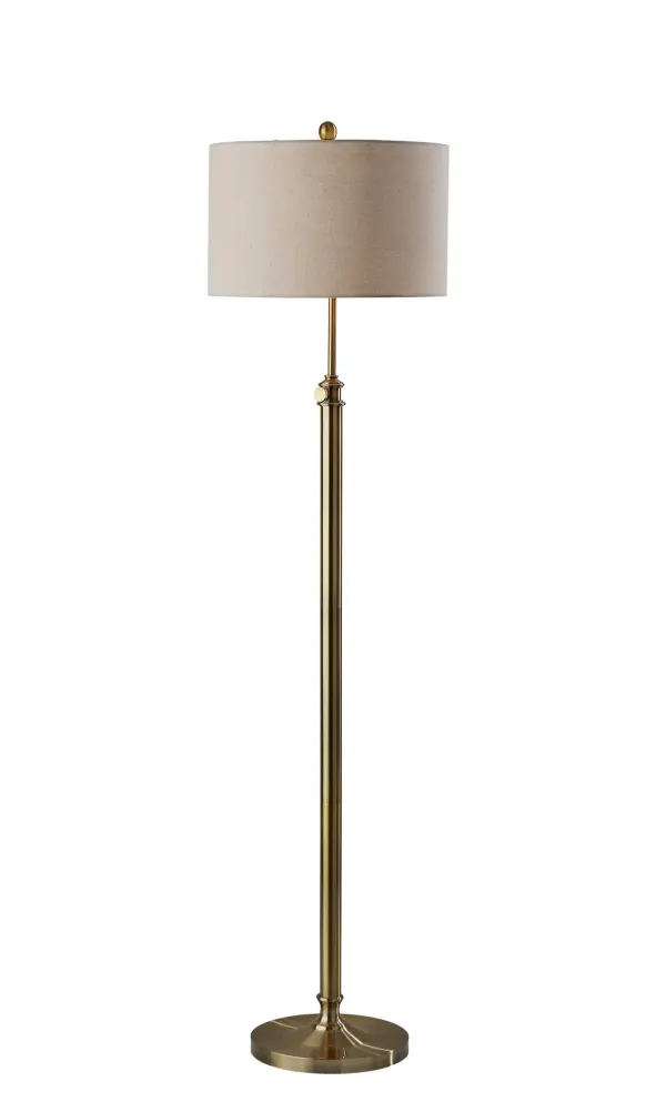The Barton Floor Lamp combines functionality with style, featuring an adjustable height mechanism (57-65.5 inches) and warm antique brass finish. The oatmeal linen shade provides soft, ambient lighting perfect for reading or relaxing.