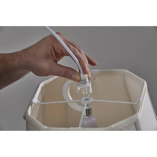 This large drum pendant offers instant style transformation with its portable swag cord design. The natural white textured fabric shade provides soft, diffused lighting perfect for spaces needing flexible illumination without hardwiring. - alternate view