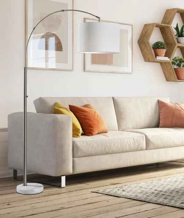 The Rigley Arc Lamp combines contemporary elegance with practical functionality. Its brushed steel finish and white marble base create a luxurious focal point, while the 50-inch reach provides versatile lighting coverage for reading nooks, seating areas, or workspaces. - alternate view