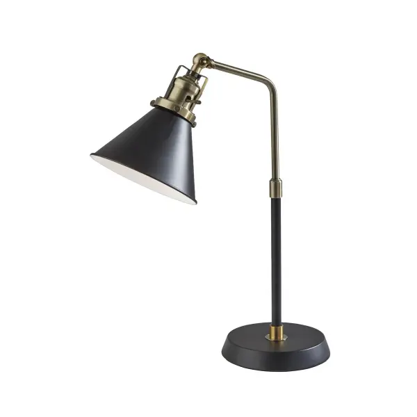 The Arthur Desk Lamp combines industrial charm with modern functionality. Its adjustable shade and compact 19.5" profile make it perfect for small workspaces, while the black and antique brass finish adds sophisticated style.