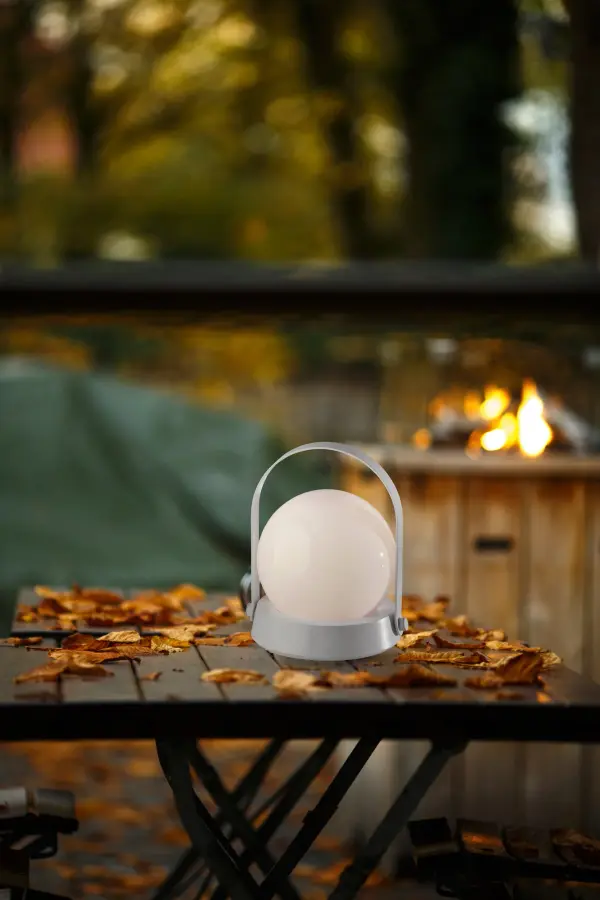 The Millie LED lantern combines portability with ambiance, featuring rechargeable battery operation, 7 color modes, and damp location certification. Perfect for indoor and outdoor use with convenient touch controls. - alternate view