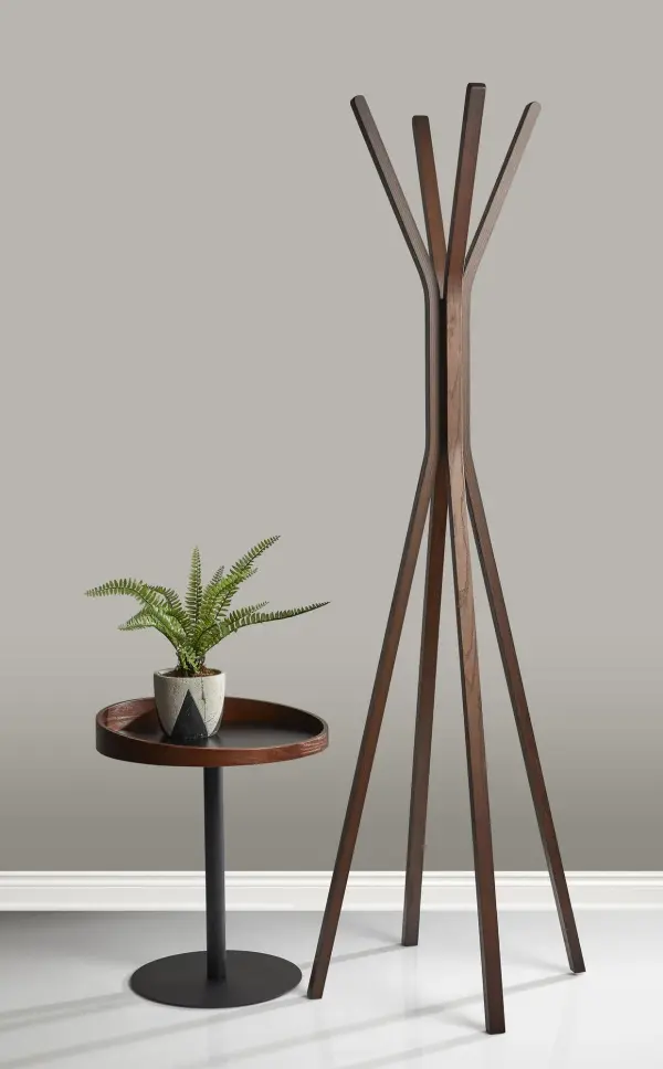 The Crater End Table combines industrial metal with warm walnut wood in a distinctive mid-century design. Its unique uneven walnut rim creates a secure surface for drinks and valuables while adding visual interest. - alternate view