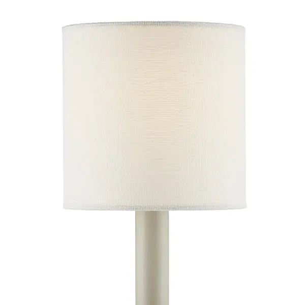 This petite grasscloth shade brings organic warmth with its finely handwoven texture. The delicate off-white hue reads like linen while subtle knots prove its artisanal quality. The rolled edge detail adds a tailored, refined finish.