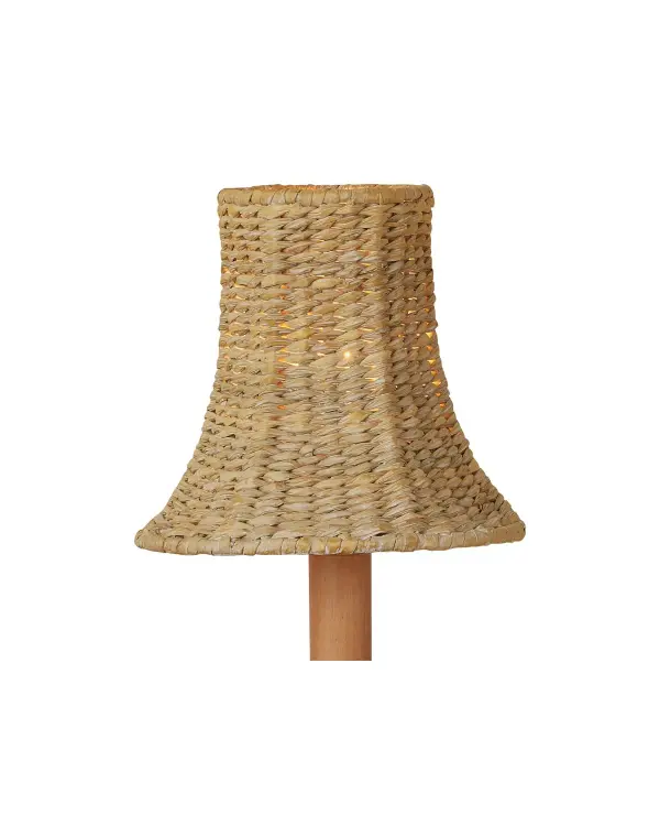 This artisan-made bell shade in natural seagrass adds warmth and coastal charm to chandeliers and pendants. Each piece showcases unique textural variations from the handwoven construction, perfect for layering natural elements into modern or traditional interiors.