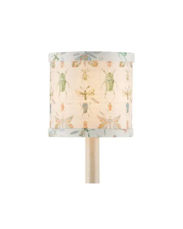 This charming drum shade from Lacefield Designs features colorful insects on ivory cotton fabric. Perfect for children's rooms or playful spaces, it brings personality without overwhelming the room.