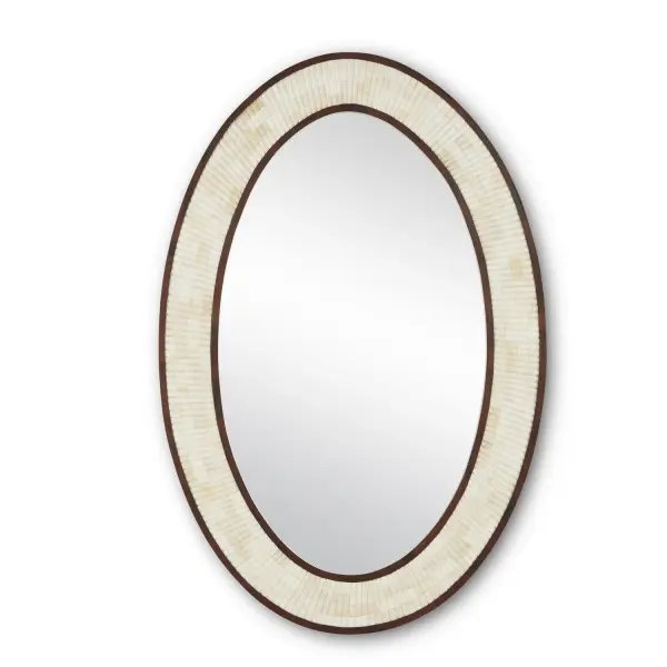 The Andar Oval Mirror combines natural bone with dark walnut wood for a refined, organic aesthetic. Its elliptical shape and ribbed bone texture create visual interest while maintaining versatility across design styles.
