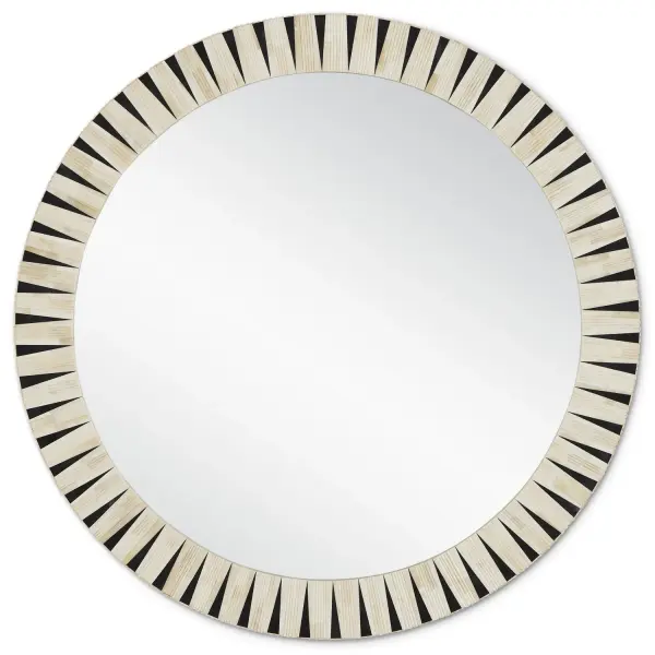The Arvi Round Mirror showcases exceptional craftsmanship with its interlaced pattern of carved ivory bone and smooth black composite. The convex carved details add dimensional interest, making it a statement piece for any space.