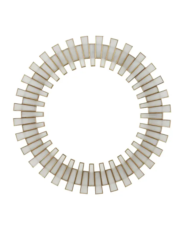 The Glasdele Round Mirror showcases exceptional craftsmanship with its frosted milky glass segments precisely fitted into antique brass edging. The mathematical precision required creates a uniform, sophisticated look that bridges traditional and contemporary design.