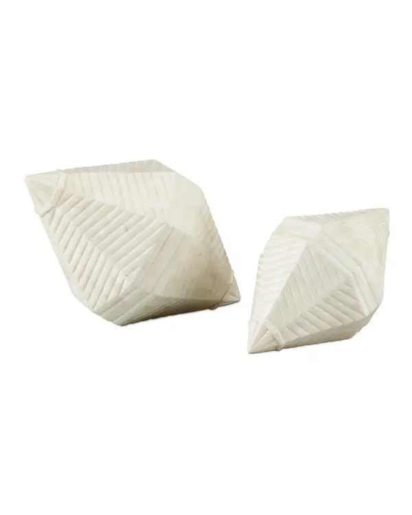 These artisanal white sculptures showcase exceptional craftsmanship with intricate bone inlay covering organically shaped prism forms. The shell-inspired design adds sculptural interest to any space while maintaining a refined, natural aesthetic.