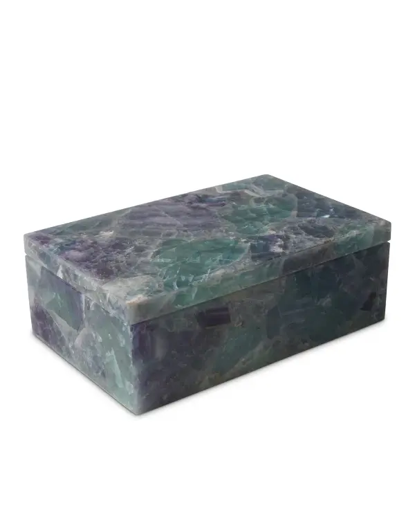 A stunning decorative accessory crafted from solid Fluorite panels with natural iridescence. Each piece is unique with variations in purple, pink, and green tones. The honed interior contrasts beautifully with the matte exterior finish.