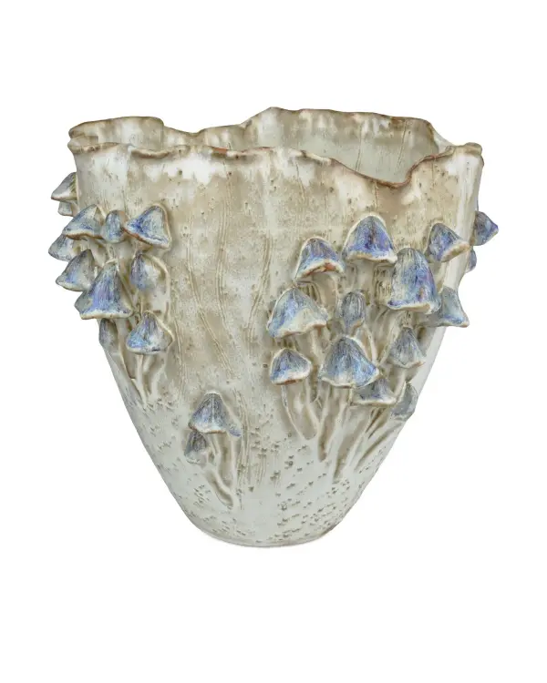 This artisanal ceramic vase showcases exceptional craftsmanship with hand-applied blue reactive glaze mushroom accents. Each piece is uniquely hand-thrown by women artisans at the Thailand-Burma border, making it a conversation-worthy decorative accent.