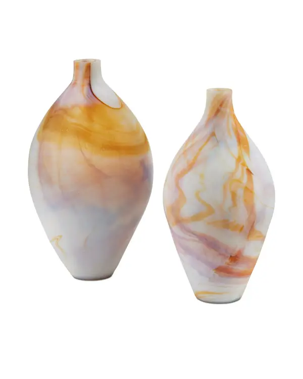 These striking vases showcase experimental glassmaking techniques that create a ceramic appearance through unique coating. The orange-streaked white finish adds warmth and visual interest, making them standout decorative pieces.