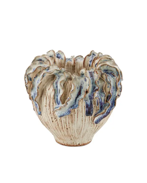 This small decorative vase showcases exceptional craftsmanship with hand-pinched ceramic leaves forming elegant ruffles, finished in ivory with reactive blue glazing. The artisanal technique creates unique variations in each piece.