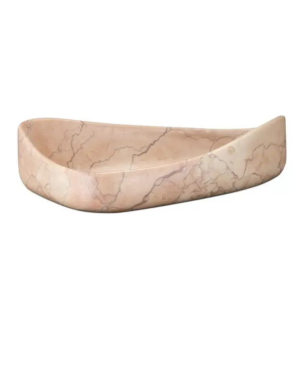 This generously sized decorative bowl showcases the natural beauty of Rosa Cappuccino marble with soft pink tones and distinctive darker veining. Its gently undulating organic shape makes it a striking statement piece.