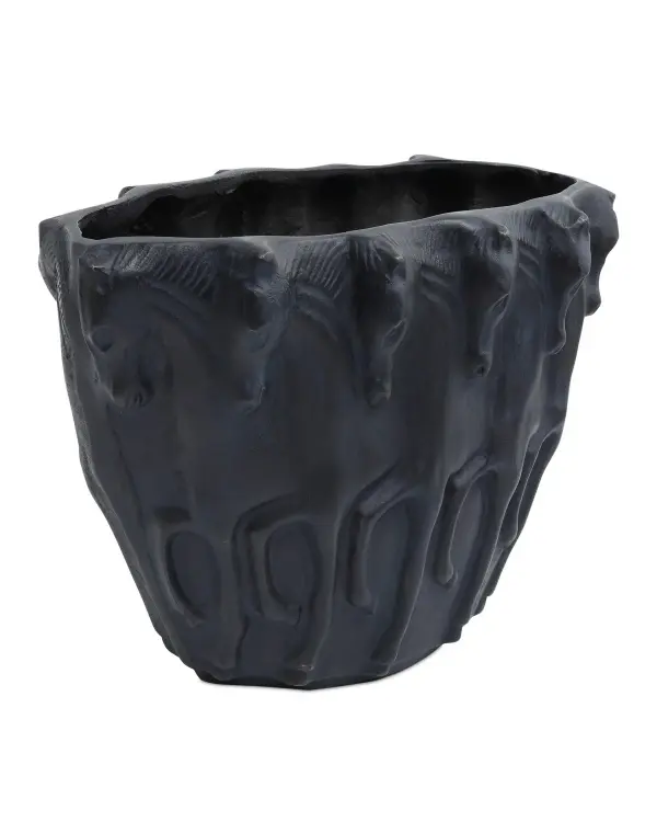 The Dressage Oval Vase brings sophisticated equestrian elegance to any space with its cast aluminum construction and distinctive bronze verdigris finish. Horse motifs add artistic character while the oval form offers versatile styling options.