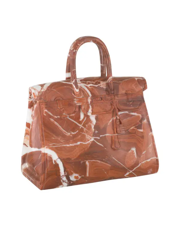 A striking decorative sculpture crafted from Italian Arabescato Orobico Red marble, inspired by an iconic fashion purse. Each piece features unique natural veining patterns, making it a sophisticated statement piece for design-conscious spaces.