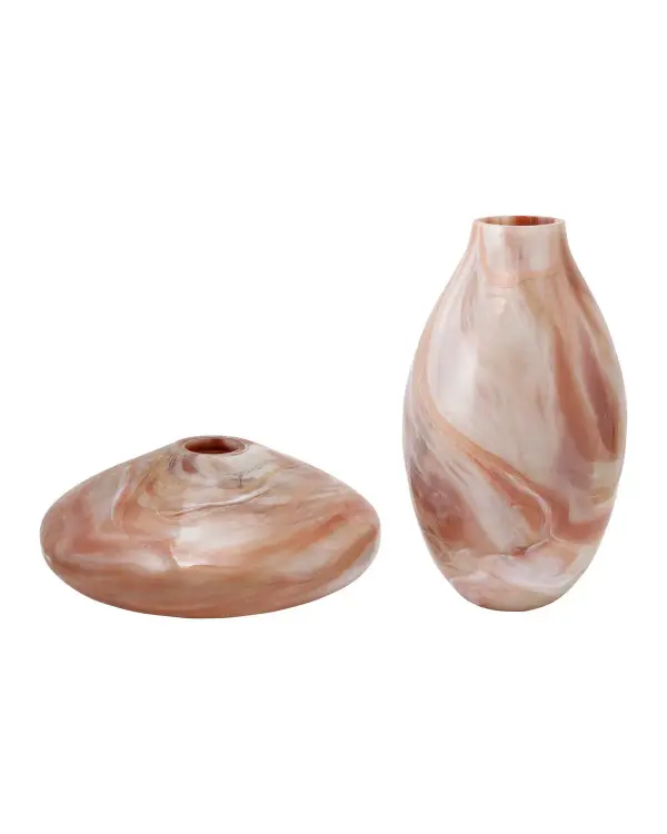 These handcrafted vases showcase the beauty of marbleized glass artistry, with swirling rust-toned patterns that mimic natural marble. Each piece is unique due to the artisanal glassmaking process, making them statement décor items.