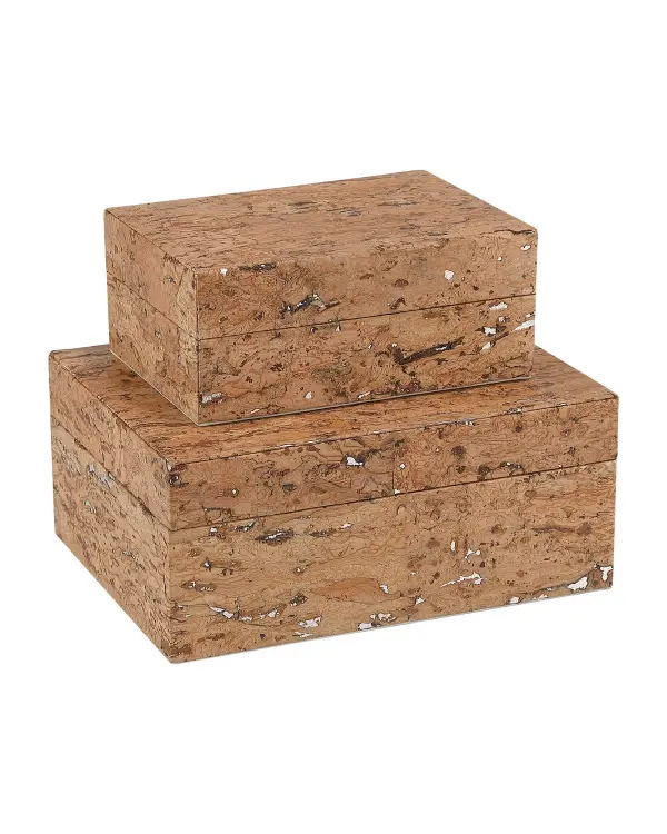 These handcrafted decorative boxes showcase natural cork veneer over iridescent silver paper, creating subtle shimmer through the material's organic perforations. Velvet-lined interiors add luxury while the natural variations make each set unique.