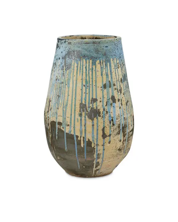 This substantial terracotta planter brings timeless Italian garden elegance to any space. The antique white base with blue drip glaze and intentionally pitted surface creates an heirloom aesthetic that works beautifully indoors or out.