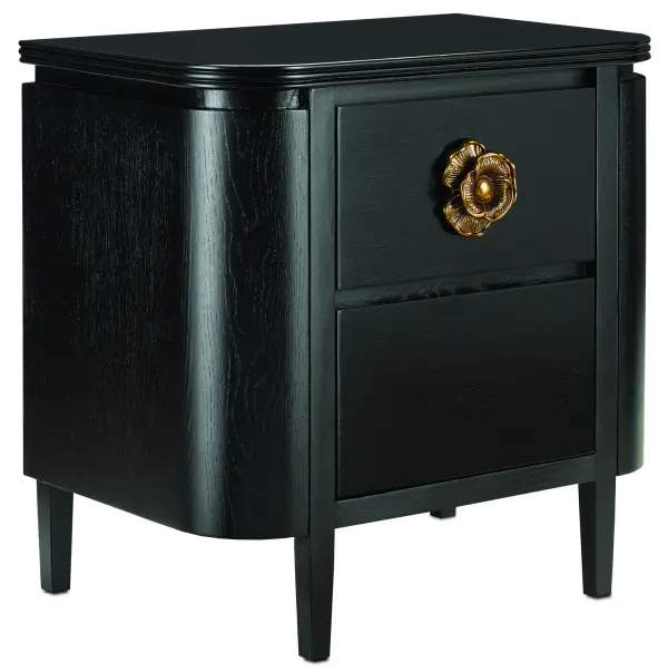 The Briallen Nightstand combines rich Caviar black oak with a hand-cast antique brass floral pull, creating a refined statement piece. Its generous 28-inch width provides ample surface and storage space for bedside essentials.
