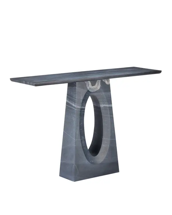 A striking console table crafted from solid Bheslana marble featuring carved oval cut-outs on both sides that create an architectural oculus effect. The tapered base and chamfered top detail add sophisticated dimension.