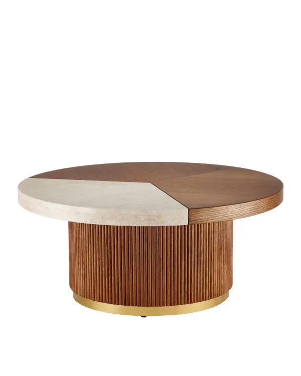 The Dakota Large Cocktail Table combines solid oak construction with luxurious Crema Marfil marble inlay and polished brass accents. Its reeded pedestal base and thoughtful chamfered details create a sophisticated centerpiece.
