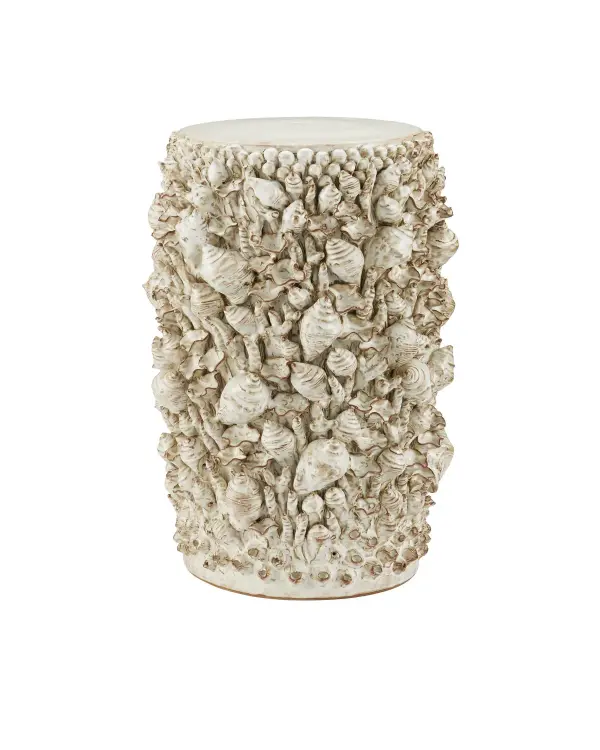 The Corfu Accent Table is a stunning artisanal piece featuring handmade ceramic shell details applied one at a time. Its compact 12.5-inch diameter makes it perfect for tight spaces while the intricate craftsmanship adds sculptural interest.