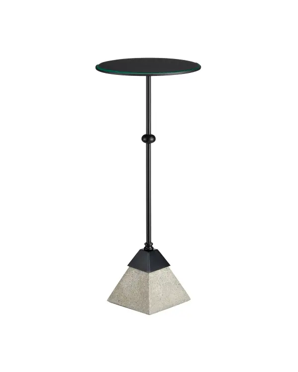 The Parna combines raw industrial materials with refined craftsmanship. Its pyramid concrete base and slender iron frame create a sculptural presence, while the beveled glass top adds sophistication to any contemporary space.