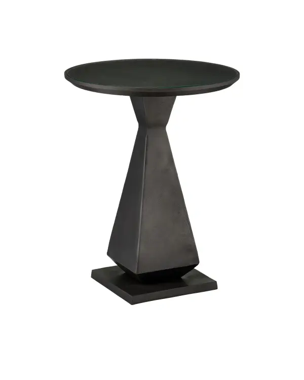 The Janil Accent Table combines substantial cast aluminum construction with a geometric silhouette and graphite finish. Its generous 19.75-inch width and glass top insert make it both a functional and striking accent piece.