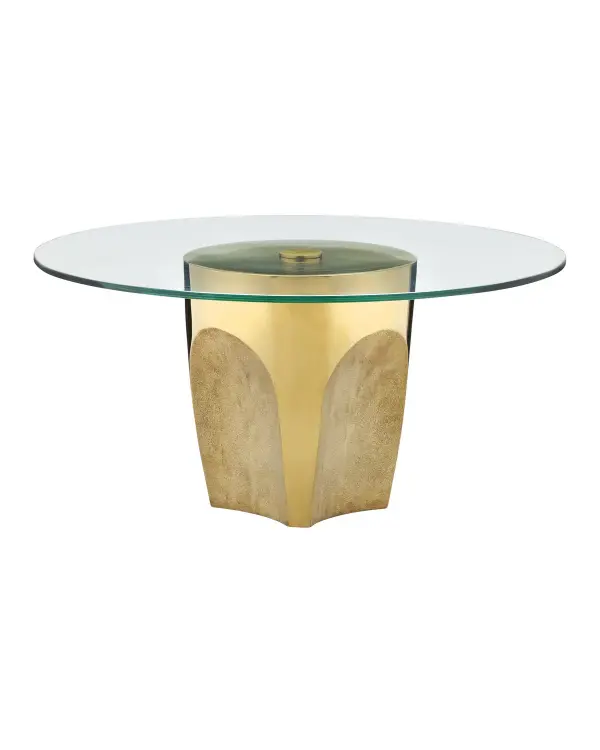 A striking contemporary cocktail table that combines polished brass stainless steel with tempered glass. The textural carved indentions create visual interest while the substantial 104-lb construction ensures stability and quality.