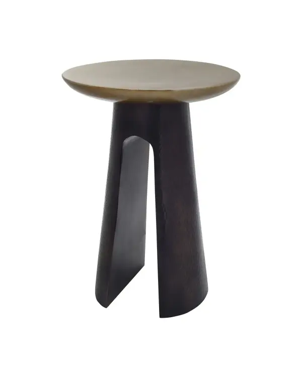 The Pince Accent Table combines black nickel and antique brass finishes in a cast aluminum construction, creating a striking mixed-metal aesthetic. Its compact 15.25" footprint makes it ideal for tight spaces while the substantial 20-pound weight ensures stability.