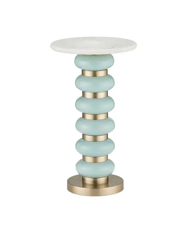 A striking drinks table featuring stacked turquoise glass bulbs separated by brushed brass bands, topped with natural white marble. The design pays homage to mid-century Danish glassware, offering both functional surface space and artistic presence.