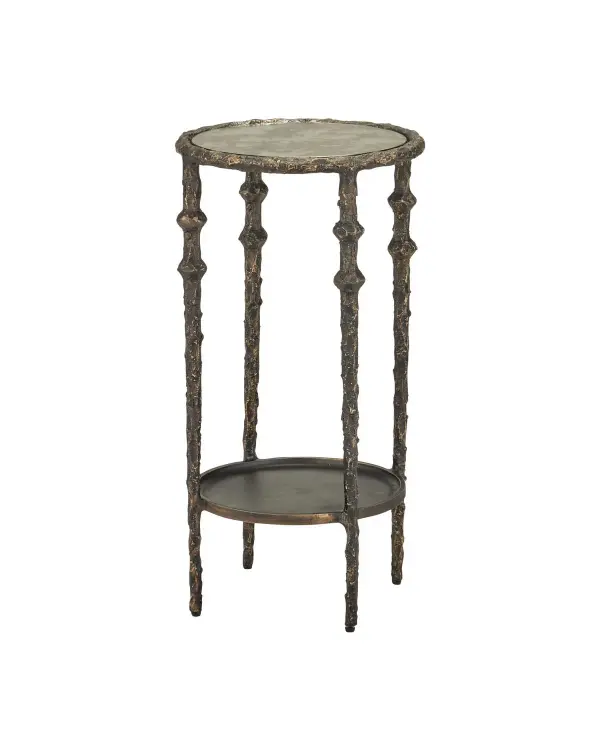 A striking accent table that blends traditional turned forms with surreal sculptural texture. The aged brass finish and antique mirror top create an artful statement piece that bridges classic and contemporary design sensibilities.
