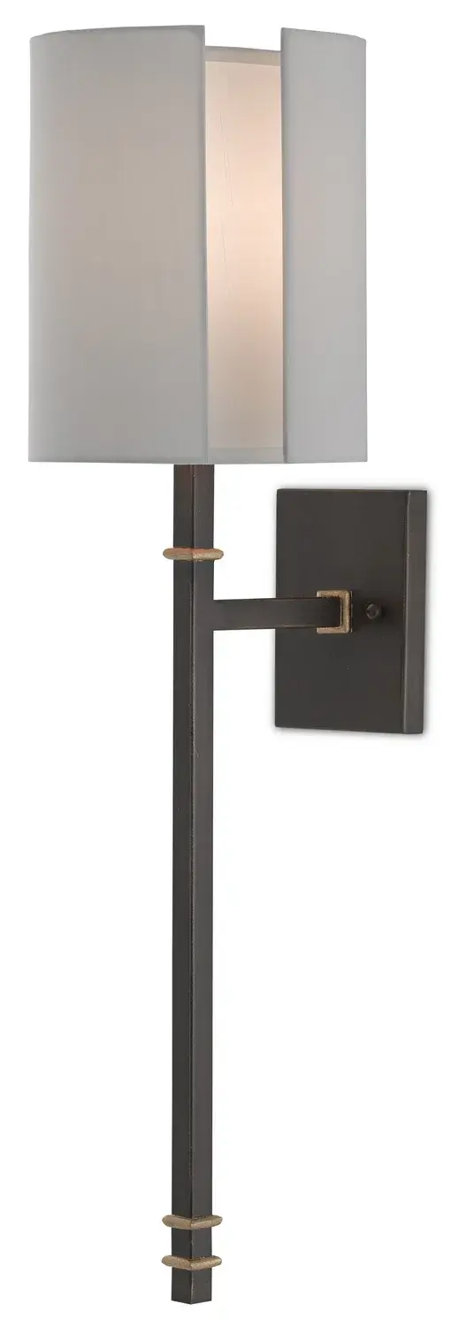 The Rocher Wall Sconce combines hand-rubbed bronze with contemporary gold leaf accents for a refined, layered look. Its off-white shantung shade softens the light while the wrought iron construction ensures durability and timeless appeal.