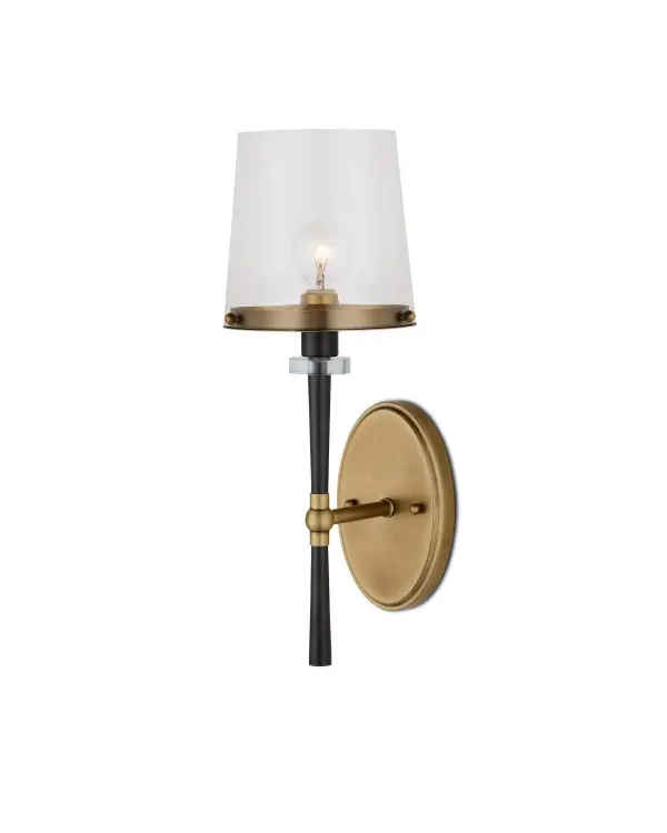 The Lyndall Wall Sconce combines clean geometric design with sophisticated mixed metal finishes. Its compact 17-inch profile and clear glass shade make it versatile for various residential and hospitality settings.