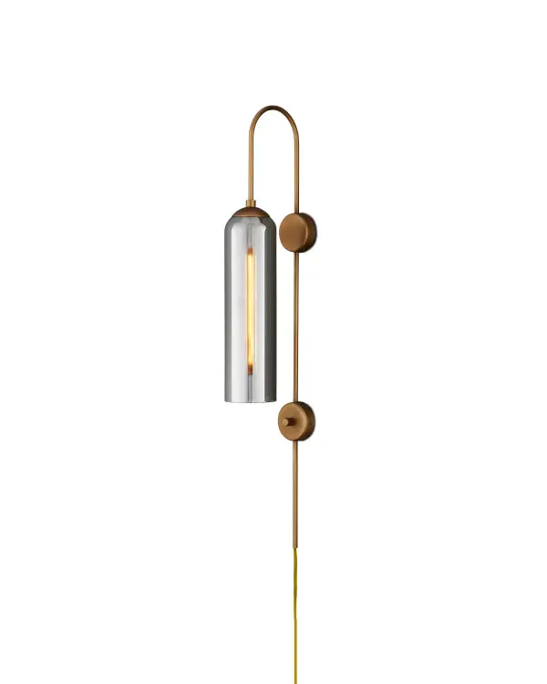 The Severn Wall Sconce combines elegant design with practical functionality, featuring a built-in dimmer switch and smoke-textured glass. Its compact profile and thoughtful lighting control make it ideal for bedside use.