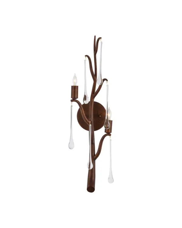 This sculptural wall sconce brings organic elegance with its twig-like form and cascading crystal droplets. The Rhine Gold finish adds warmth while the clear crystals catch and reflect light beautifully. Perfect for adding sophisticated ambiance.