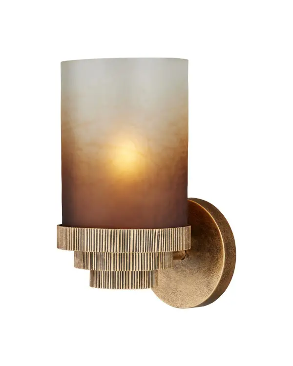 The Thorley Wall Sconce combines antique gold metalwork with a distinctive frosted ombré glass shade that transitions from white to deep gold. Linear striations on the bobeche add architectural detail, while the compact size makes it ideal for bathrooms, hallways, and intimate spaces.
