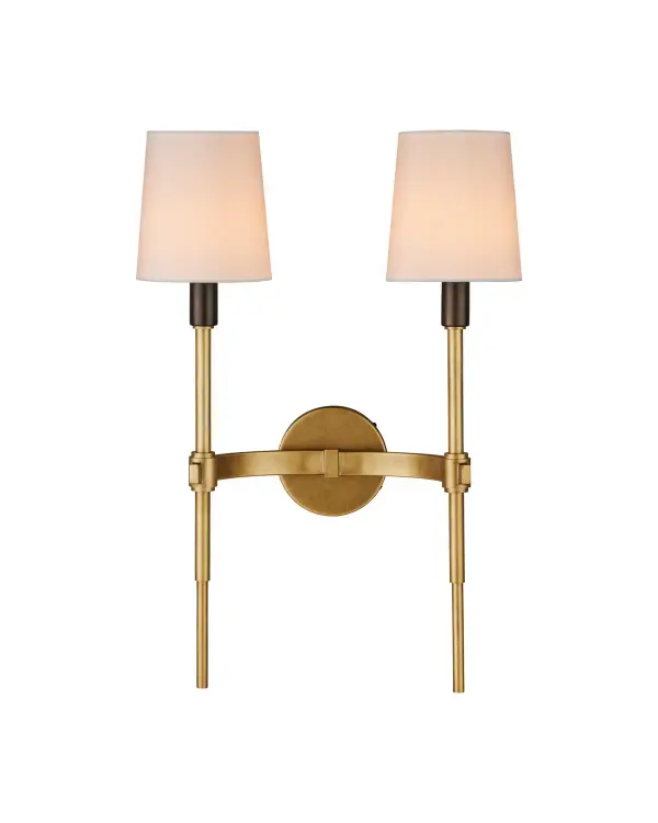 The Grigsby wall sconce combines geometric sophistication with transitional elegance. Its slim profile and arcing bands create visual interest while white fabric shades provide soft, diffused light. The mixed metal finish adds depth and versatility.
