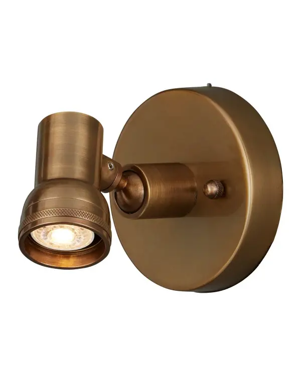 The Patterson combines traditional brass craftsmanship with modern LED efficiency. Its swivel neck allows precise artwork illumination, while knurled details add refined character. Compact at 4.5 inches wide, it's ideal for highlighting art without overwhelming the piece.