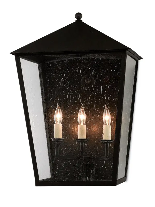 The Bening outdoor wall sconce combines durability with classic design. Its Trilux finish offers superior weather resistance with a 5-year guarantee, while seeded glass panels add vintage charm to exterior spaces.