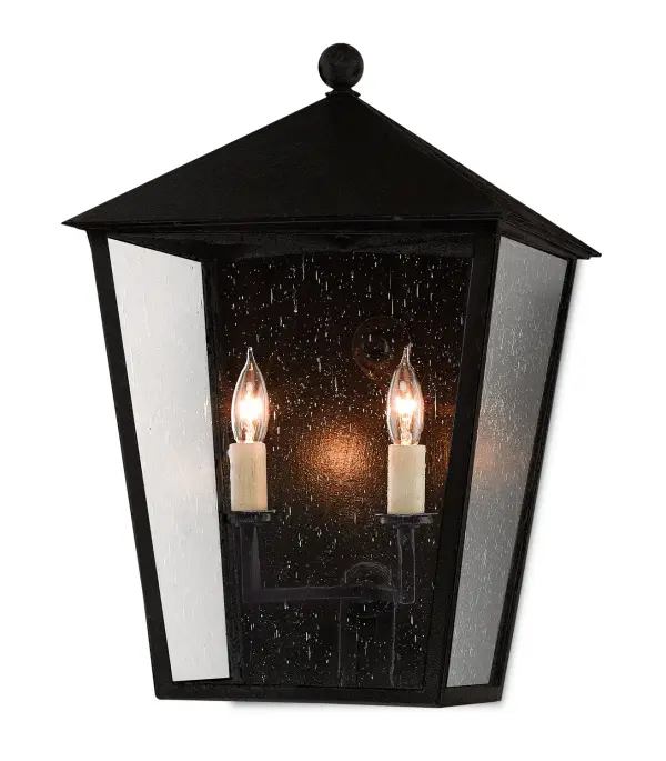 The Bening outdoor wall sconce combines durability with timeless style. Its Trilux finish offers superior weather resistance with a 5-year guarantee, while seeded glass panes add vintage charm to any exterior space.